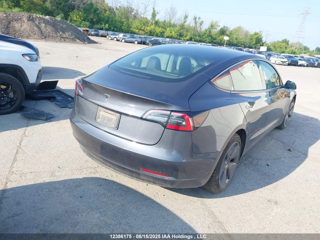 5YJ3E1EA4PF427411 Tesla MODEL 3