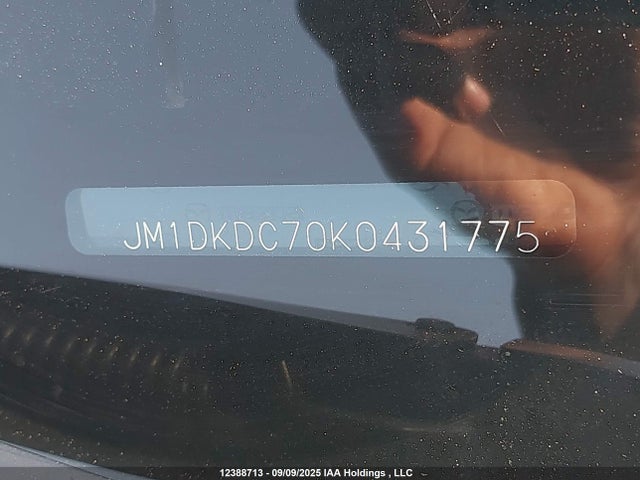 JM1DKDC70K0431775 Mazda pe