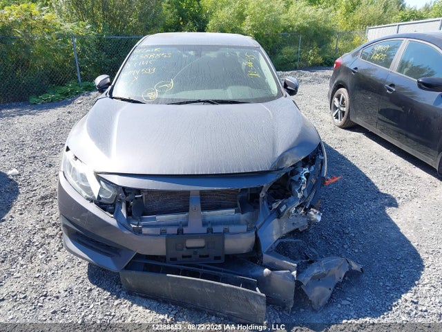 12388853 :رقم المزاد ، 2HGFC2E58JH044599 vin ، 2018 Honda Civic مزاد بيع