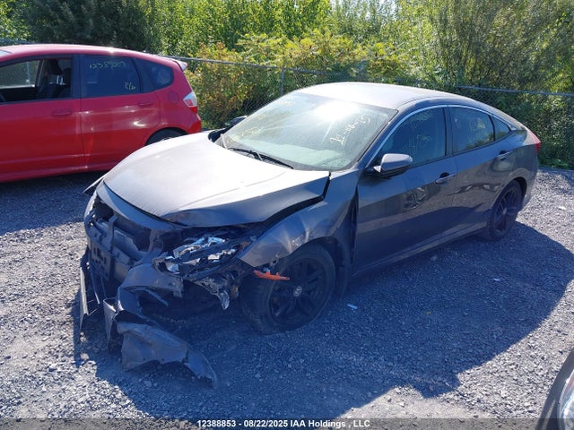 12388853 :رقم المزاد ، 2HGFC2E58JH044599 vin ، 2018 Honda Civic مزاد بيع