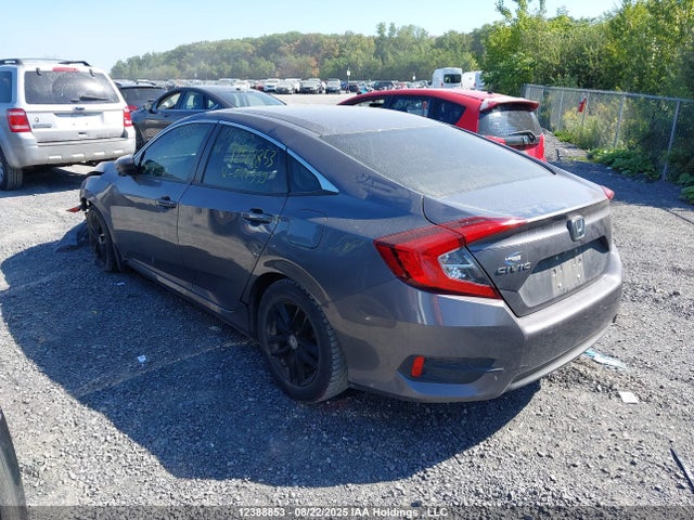 12388853 :رقم المزاد ، 2HGFC2E58JH044599 vin ، 2018 Honda Civic مزاد بيع