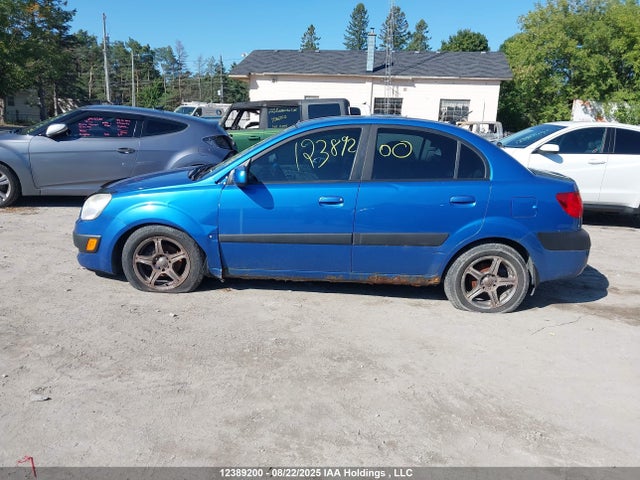 12389200 :رقم المزاد ، KNADE223396570362 vin ، 2009 Kia Rio مزاد بيع