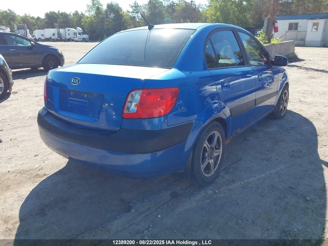 12389200 :رقم المزاد ، KNADE223396570362 vin ، 2009 Kia Rio مزاد بيع