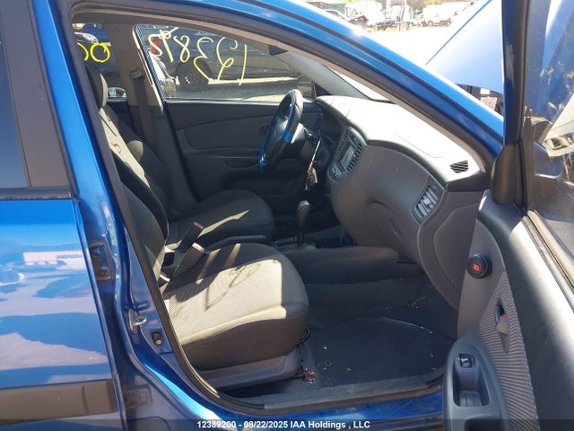 12389200 :رقم المزاد ، KNADE223396570362 vin ، 2009 Kia Rio مزاد بيع