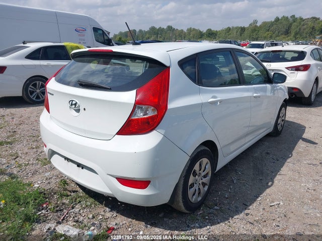 KMHCT5AEXHU352658 Hyundai 2017