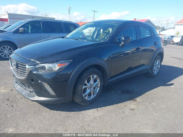 JM1DKFC75J0318575 Mazda pe