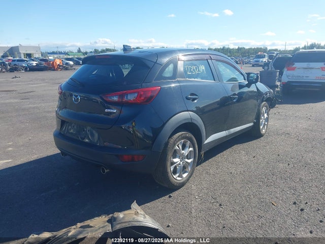JM1DKFC75J0318575 Mazda pe