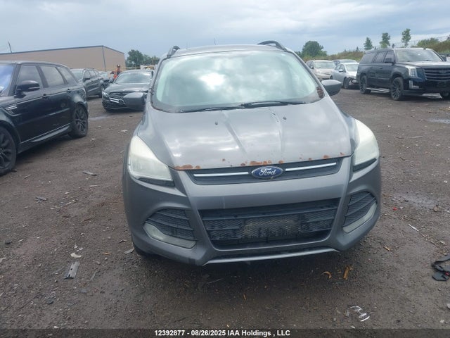 1FMCU9G90EUA95116 Ford 2014
