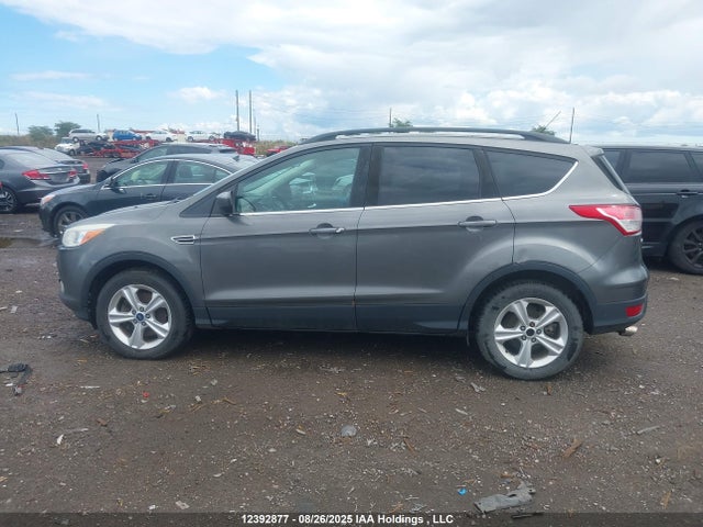 1FMCU9G90EUA95116 Ford 2014