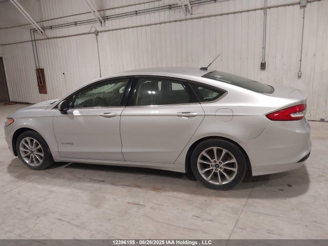 12396155 :رقم المزاد ، 3FA6P0UU4HR134661 vin ، 2017 Ford Fusion Hybrid S مزاد بيع