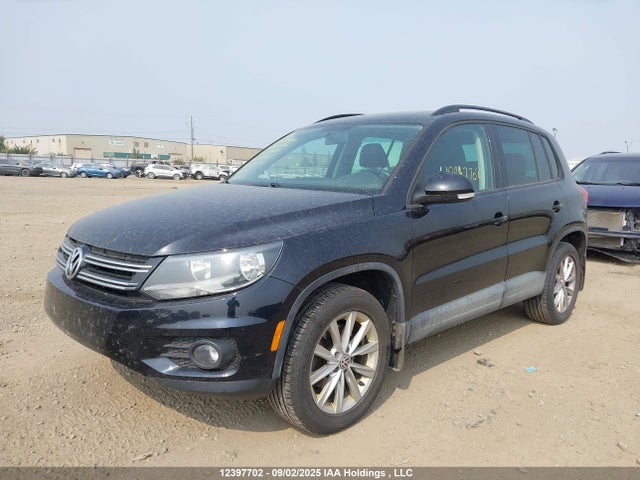 WVGJV3AX0EW573435 Volkswagen Tiguan