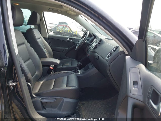 WVGJV3AX0EW573435 Volkswagen Tiguan