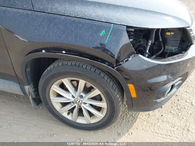 WVGJV3AX0EW573435 Volkswagen Tiguan