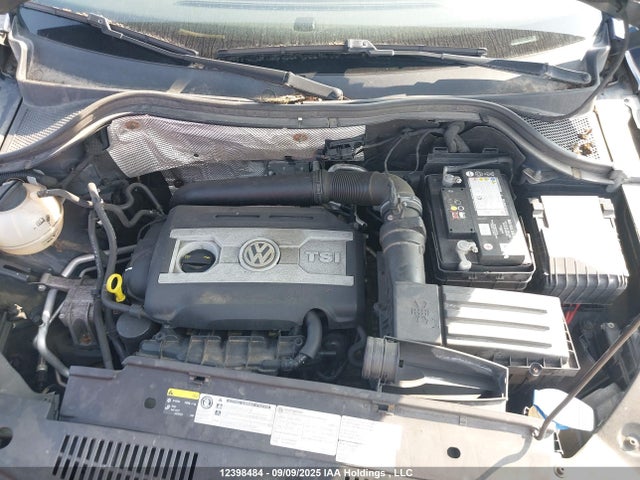 WVGMV7AX7HK031555 Volkswagen Tiguan
