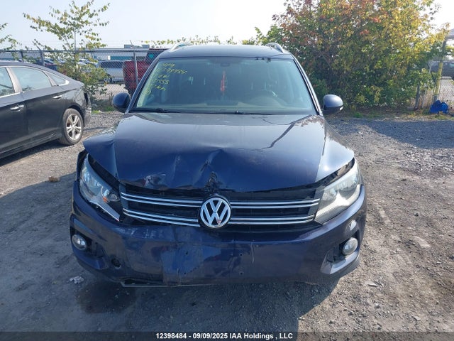 WVGMV7AX7HK031555 Volkswagen Tiguan