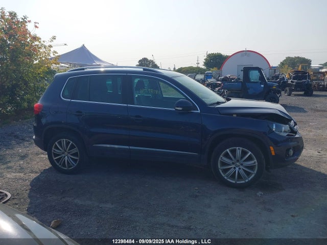 WVGMV7AX7HK031555 Volkswagen Tiguan