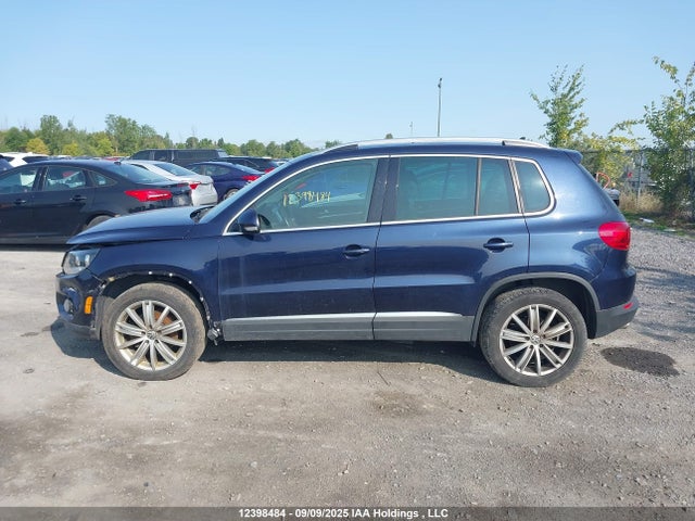 WVGMV7AX7HK031555 Volkswagen Tiguan