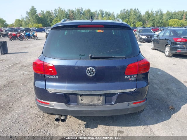WVGMV7AX7HK031555 Volkswagen Tiguan