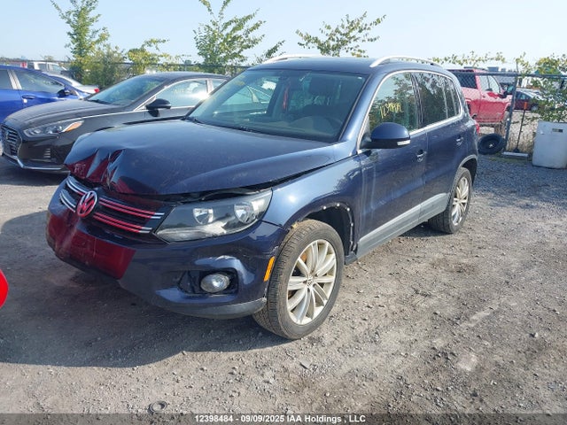 WVGMV7AX7HK031555 Volkswagen Tiguan