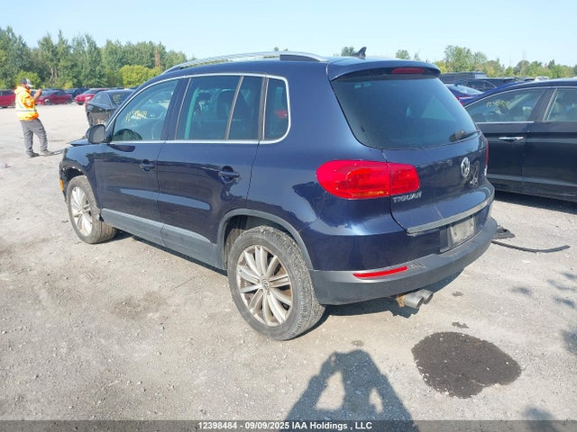 WVGMV7AX7HK031555 Volkswagen Tiguan
