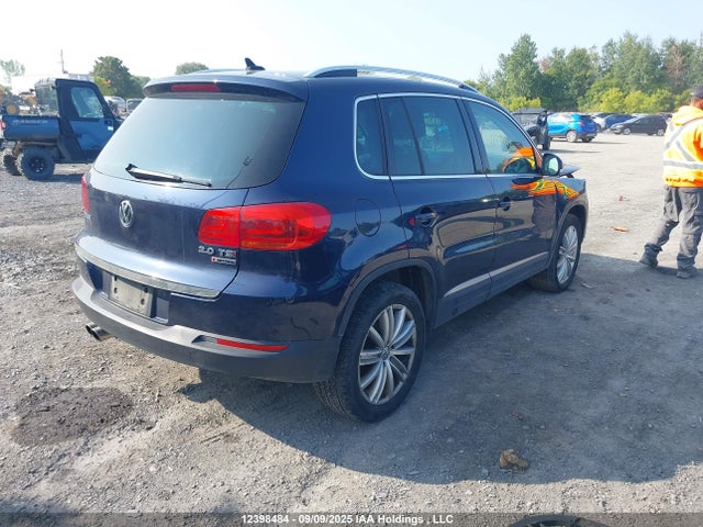 WVGMV7AX7HK031555 Volkswagen Tiguan