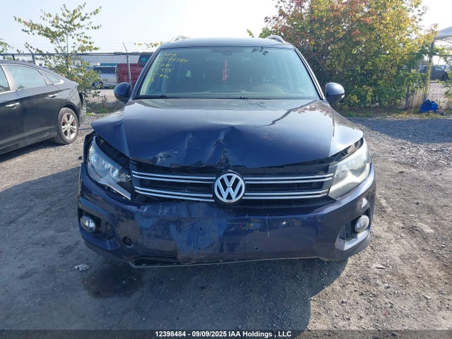WVGMV7AX7HK031555 Volkswagen Tiguan