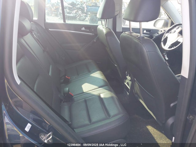 WVGMV7AX7HK031555 Volkswagen Tiguan