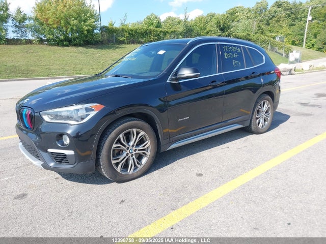 WBXHT3C34GP881517 BMW X1