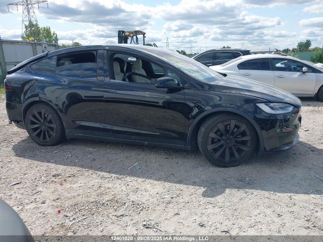 12401020 :رقم المزاد ، 7SAXCBE54PF381405 vin ، 2023 Tesla Model X Awd/standard Range مزاد بيع