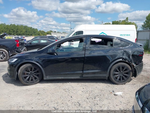 12401020 :رقم المزاد ، 7SAXCBE54PF381405 vin ، 2023 Tesla Model X Awd/standard Range مزاد بيع