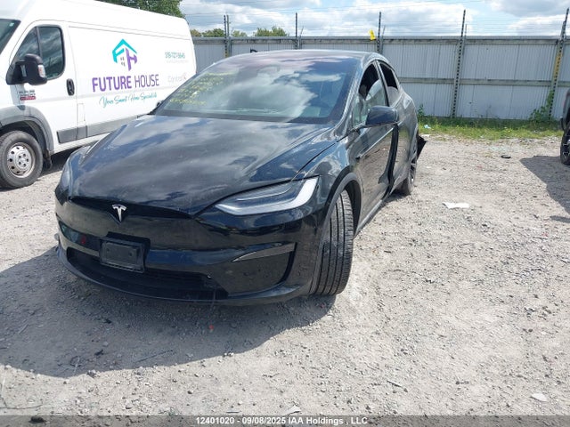 12401020 :رقم المزاد ، 7SAXCBE54PF381405 vin ، 2023 Tesla Model X Awd/standard Range مزاد بيع