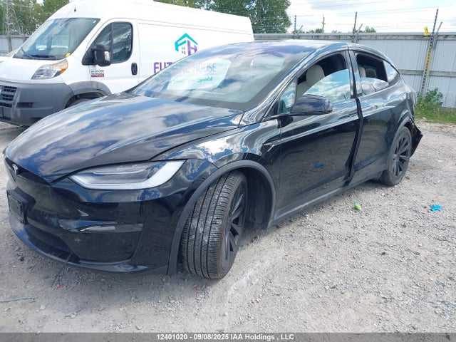 12401020 :رقم المزاد ، 7SAXCBE54PF381405 vin ، 2023 Tesla Model X Awd/standard Range مزاد بيع