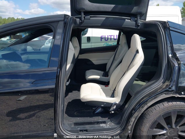 12401020 :رقم المزاد ، 7SAXCBE54PF381405 vin ، 2023 Tesla Model X Awd/standard Range مزاد بيع