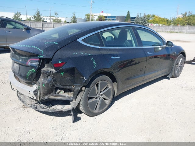 5YJ3E1EA1KF410512 Tesla 2019