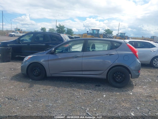 KMHCT5AE9HU330974 Hyundai Accent