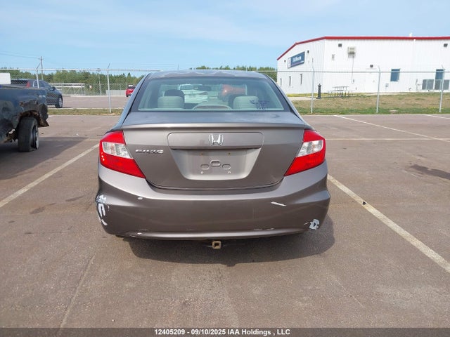 12405209 :رقم المزاد ، 2HGFB2F42CH028121 vin ، 2012 Honda Civic Lx مزاد بيع