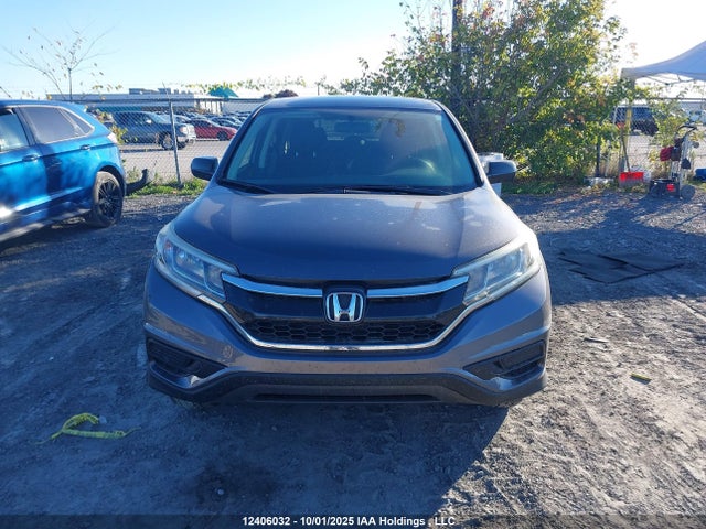 2HKRM4H38GH132910 Honda CR-V LX