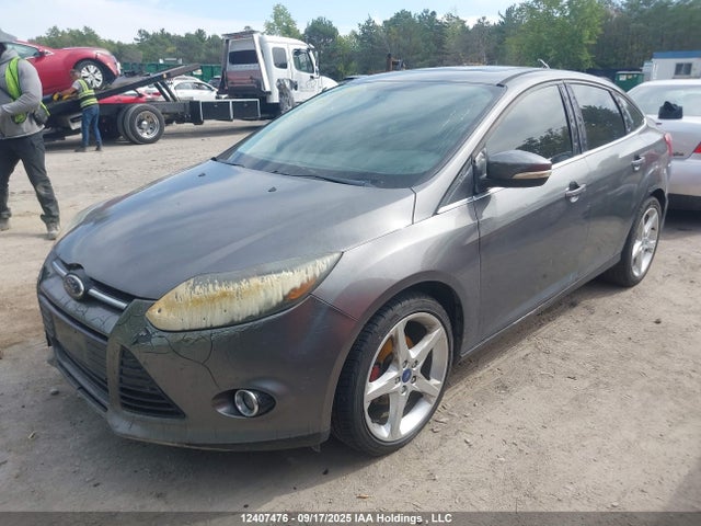 Продажа на аукционе авто 2013 Ford Focus Titanium, vin: 1FADP3J26DL147013, номер лота: 12407476