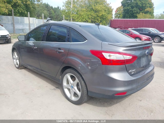 Продажа на аукционе авто 2013 Ford Focus Titanium, vin: 1FADP3J26DL147013, номер лота: 12407476