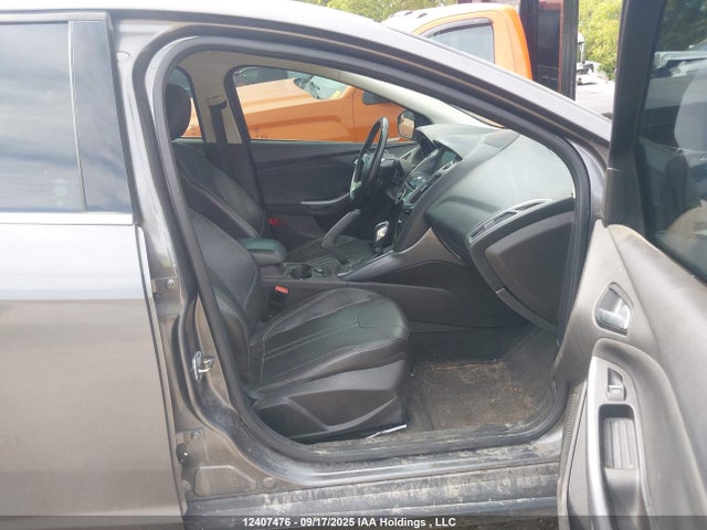 Продажа на аукционе авто 2013 Ford Focus Titanium, vin: 1FADP3J26DL147013, номер лота: 12407476