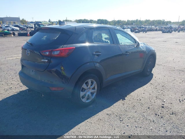 Mazda pe 2016 JM1DKFB73G0133922 Image 4