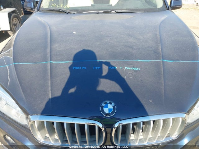 5UXKR0C56G0P33085 BMW X5