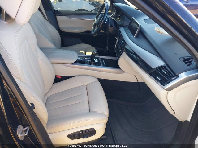 5UXKR6C58F0J76973 BMW 2015