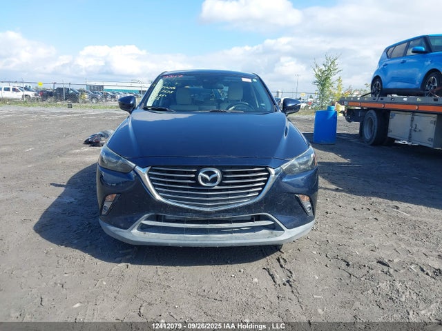 Mazda pe 2018 JM1DKFD73J0323675 Image 13