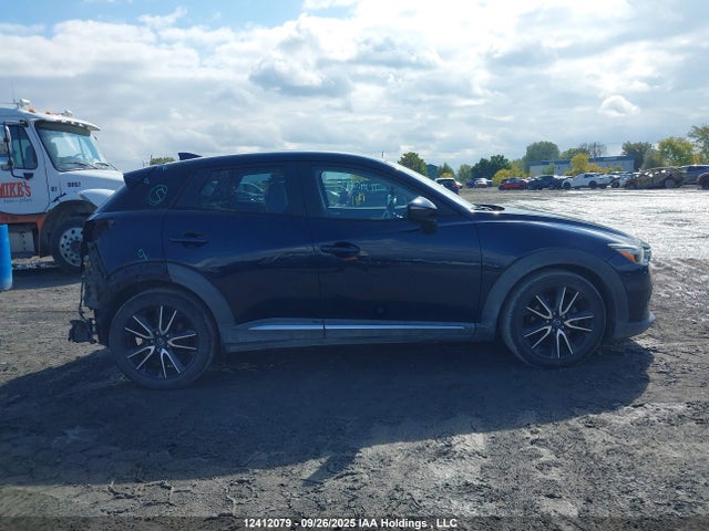 Mazda pe 2018 JM1DKFD73J0323675 Image 14