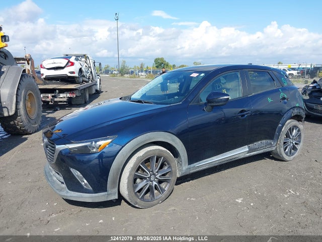 Mazda pe 2018 JM1DKFD73J0323675 Image 2