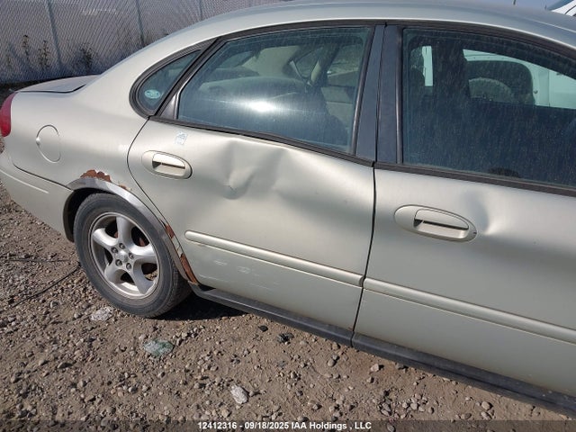 12412316 :رقم المزاد ، 1FAFP53U43G279021 vin ، 2003 Ford Taurus Se مزاد بيع