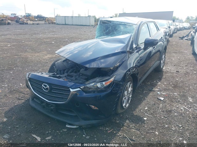 Mazda pe 2022 JM1DKDC72N1605828 Image 2