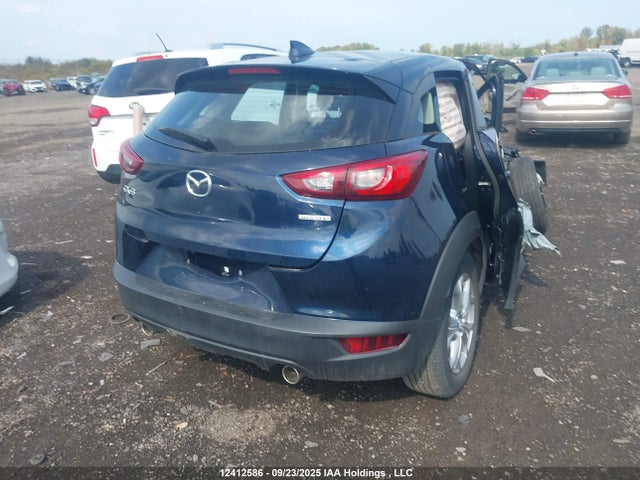Mazda pe 2022 JM1DKDC72N1605828 Image 4