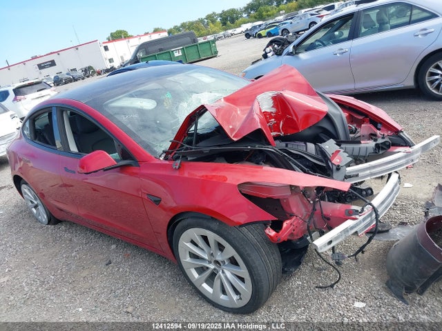 5YJ3E1EA9NF258340 Tesla 2022